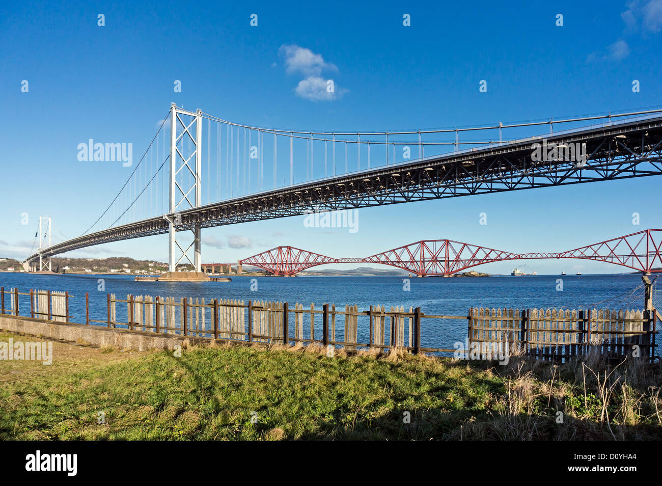 Firth of Forth road bridge near South Queensferry in Scotland with the Forth Rail Bridge behind Stock Photo