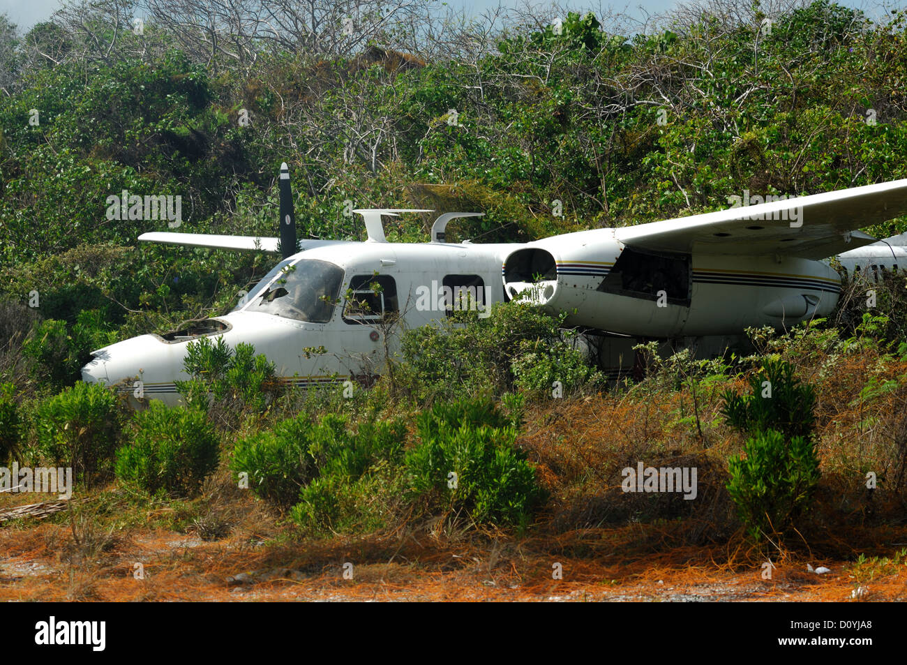 Wrecked airplane at Crooked Island Airport Bahamas Stock Photo