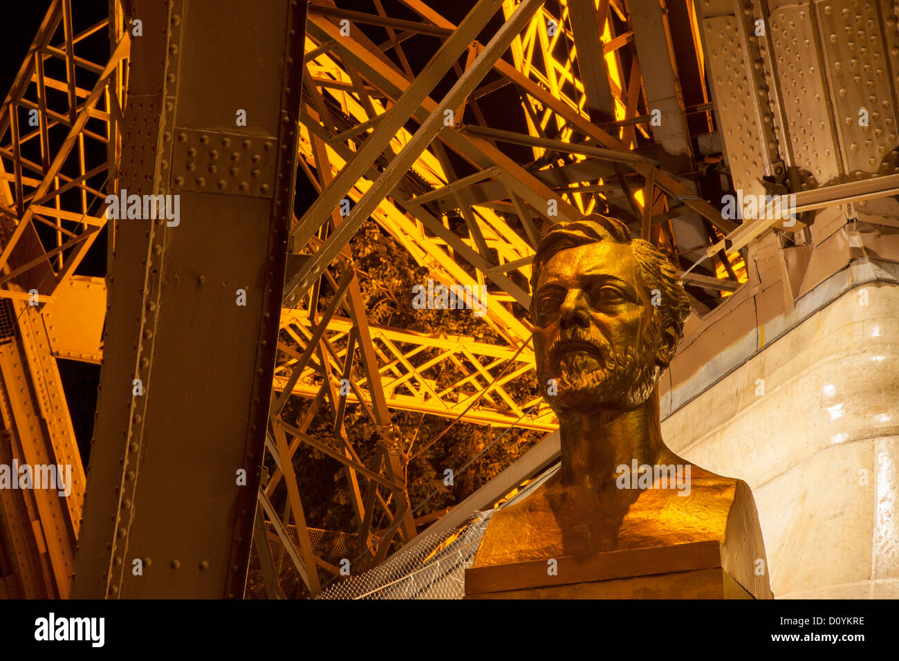 Bronze bust of Gustave Eiffel at the base of the Tower he helped design for the 1889 Worlds Fair, Paris France Stock Photo