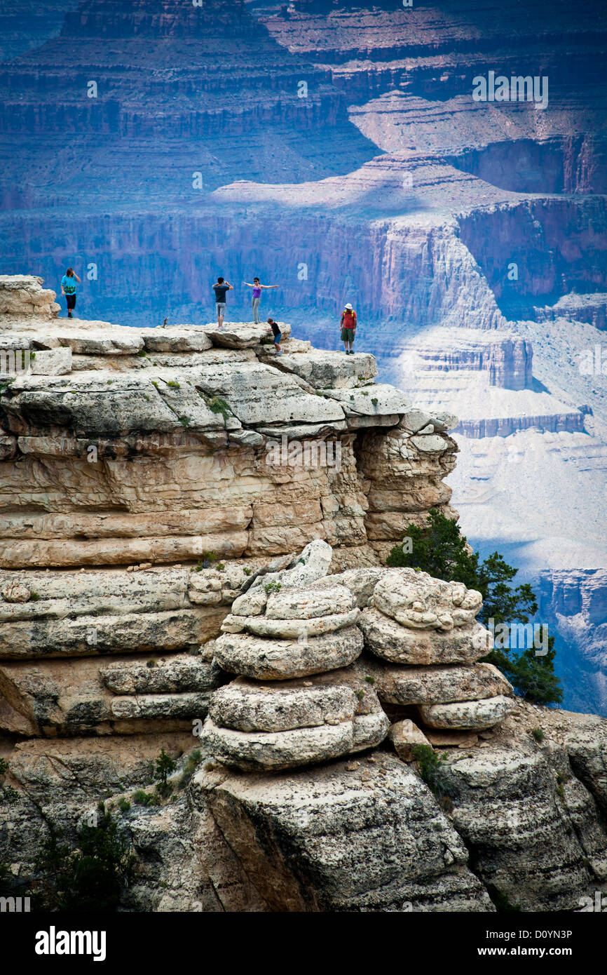 Tourists test themselves at the Grand Canyon, July 2011 Stock Photo