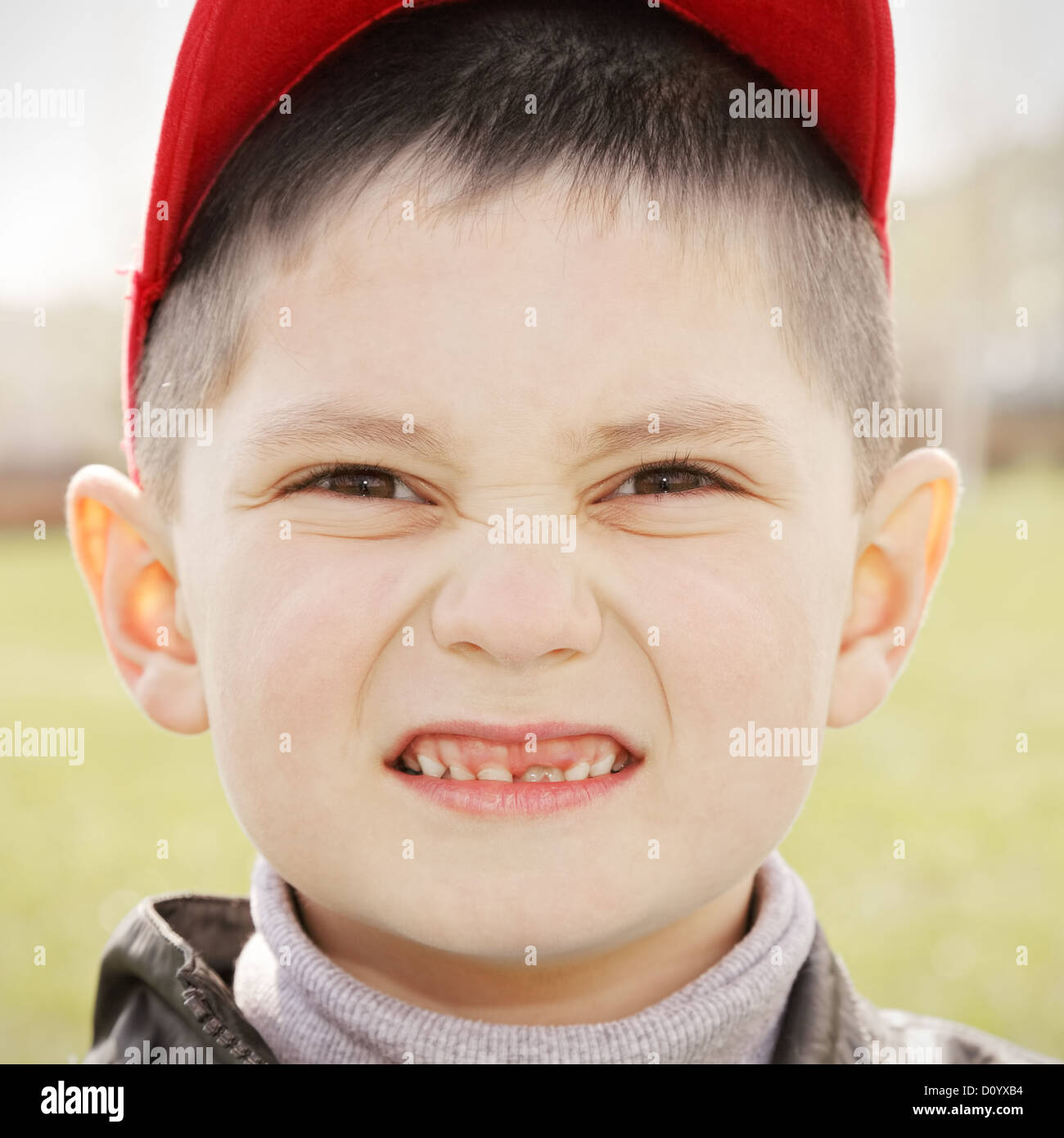 Boy in red cap Stock Photo Alamy