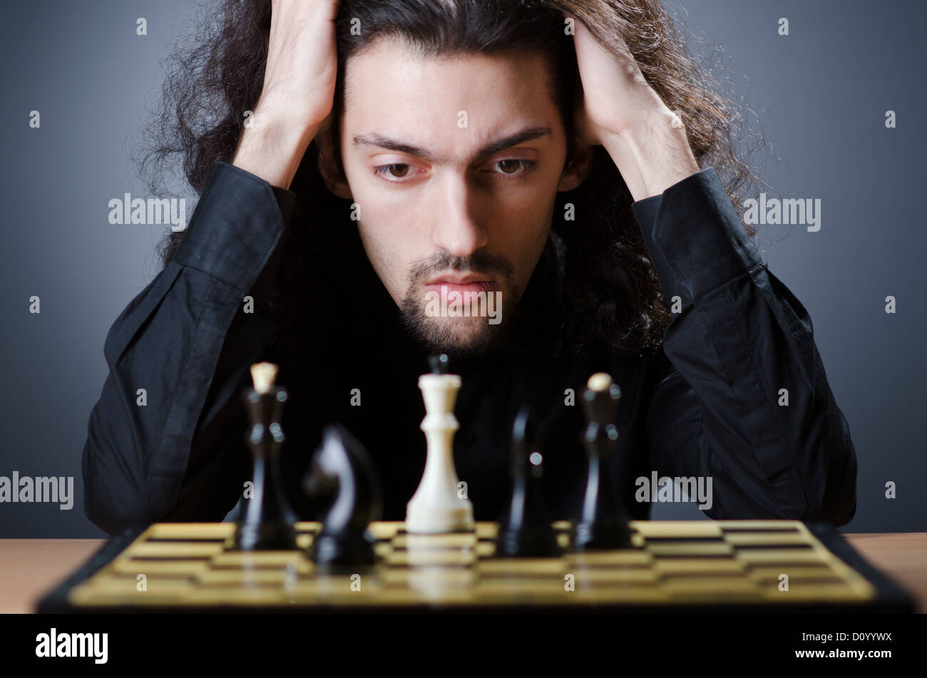 Chess player playing his game Stock Photo Alamy