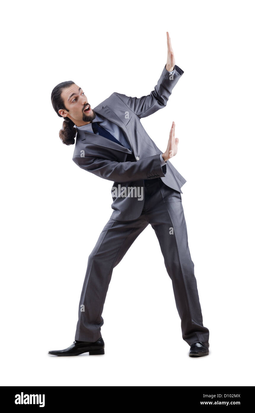 Businessman pushing away virtual obstacles Stock Photo - Alamy