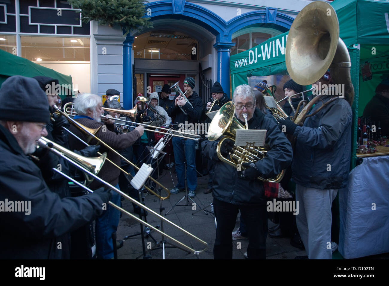 Brass band playing carols Christmas street fair Woodbridge, Suffolk, England Stock Photo Alamy