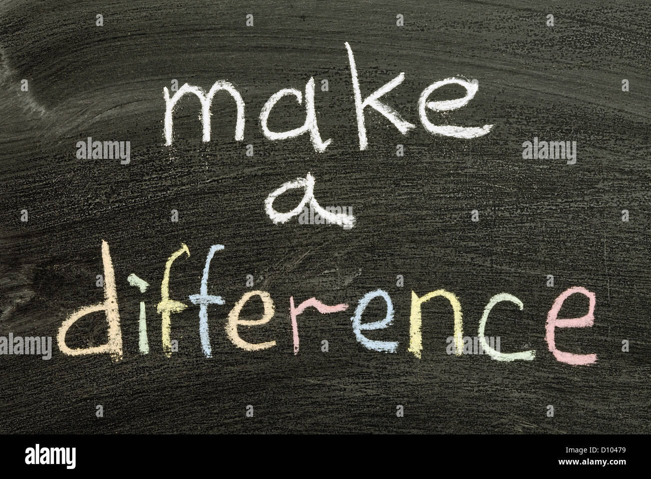 make a difference phrase handwritten on blackboard Stock Photo
