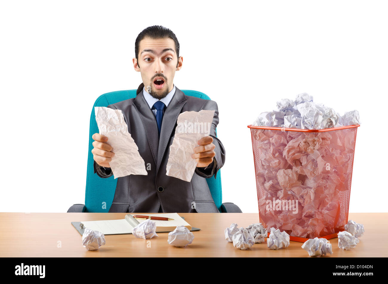 Man with lots of wasted paper Stock Photo - Alamy