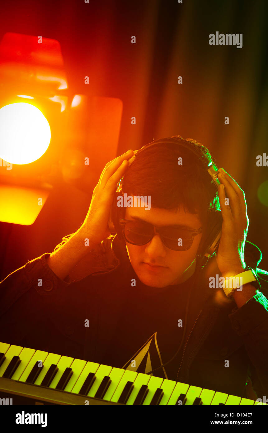 DJ mixing music at disco Stock Photo Alamy