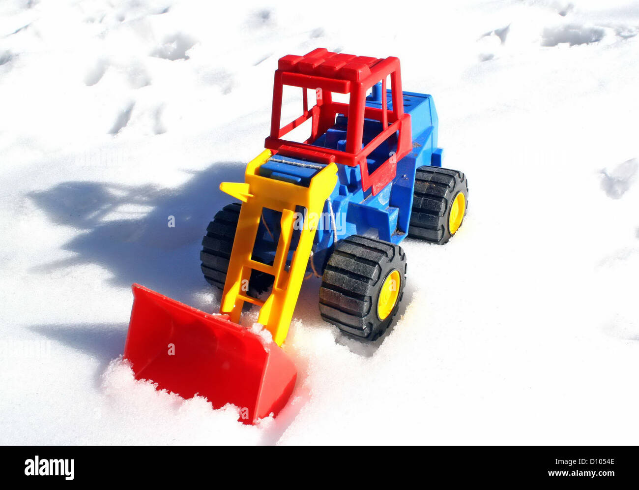 child’s toy scraper in use on fresh snow white 1 Stock Photo - Alamy