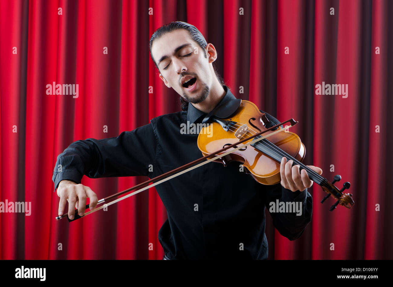 Young violin player playing Stock Photo Alamy