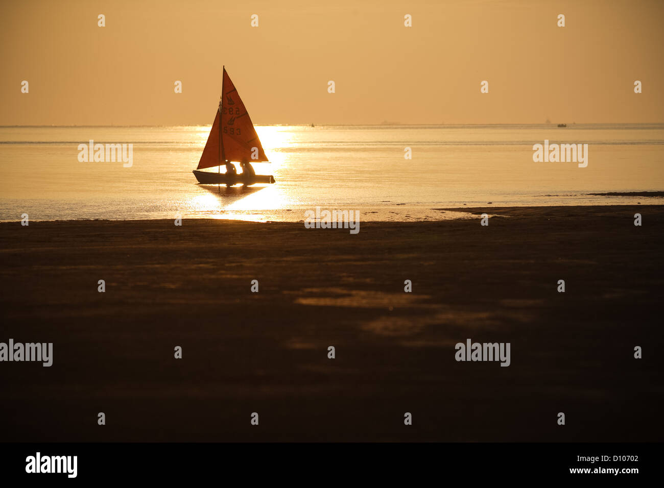 Sailing boat at sunset hi-res stock photography and images - Alamy