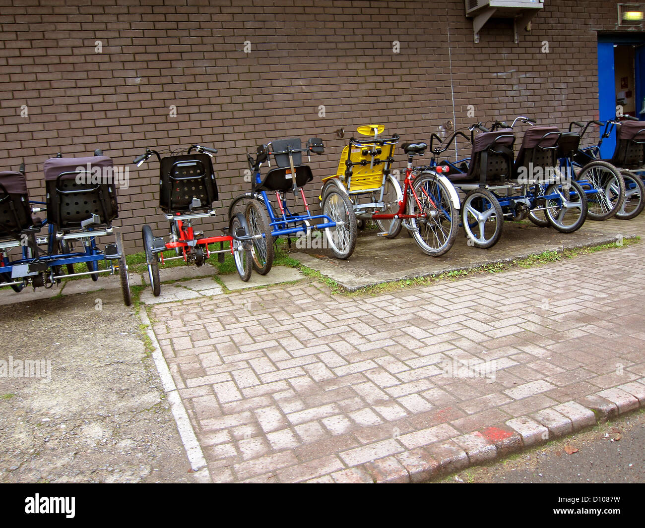 Bikes and trikes belonging to cycling for the physically disabled charity Stock Photo
