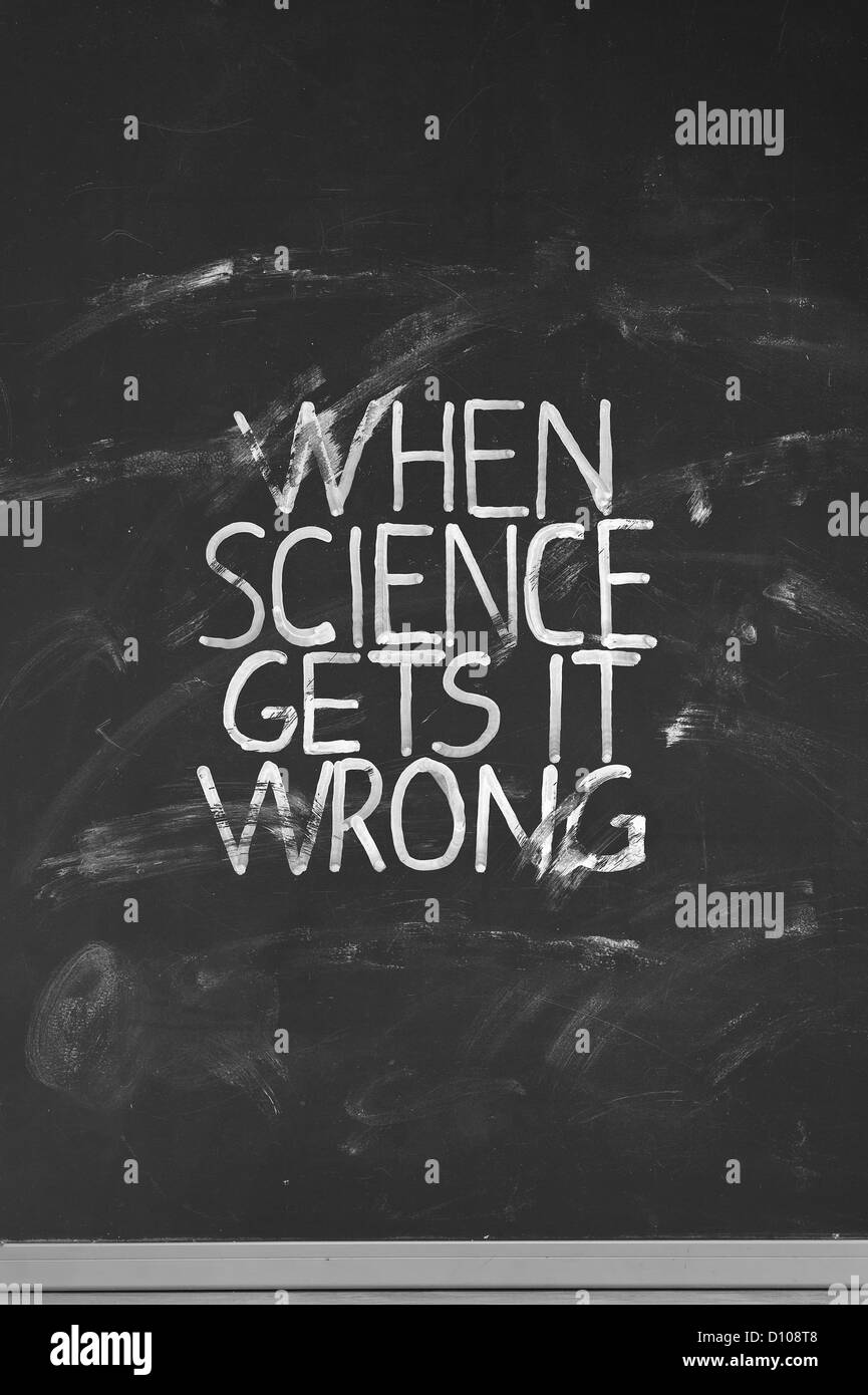 chalk black board backboard hand written letters when science gets it wrong partly rubbed out Stock Photo