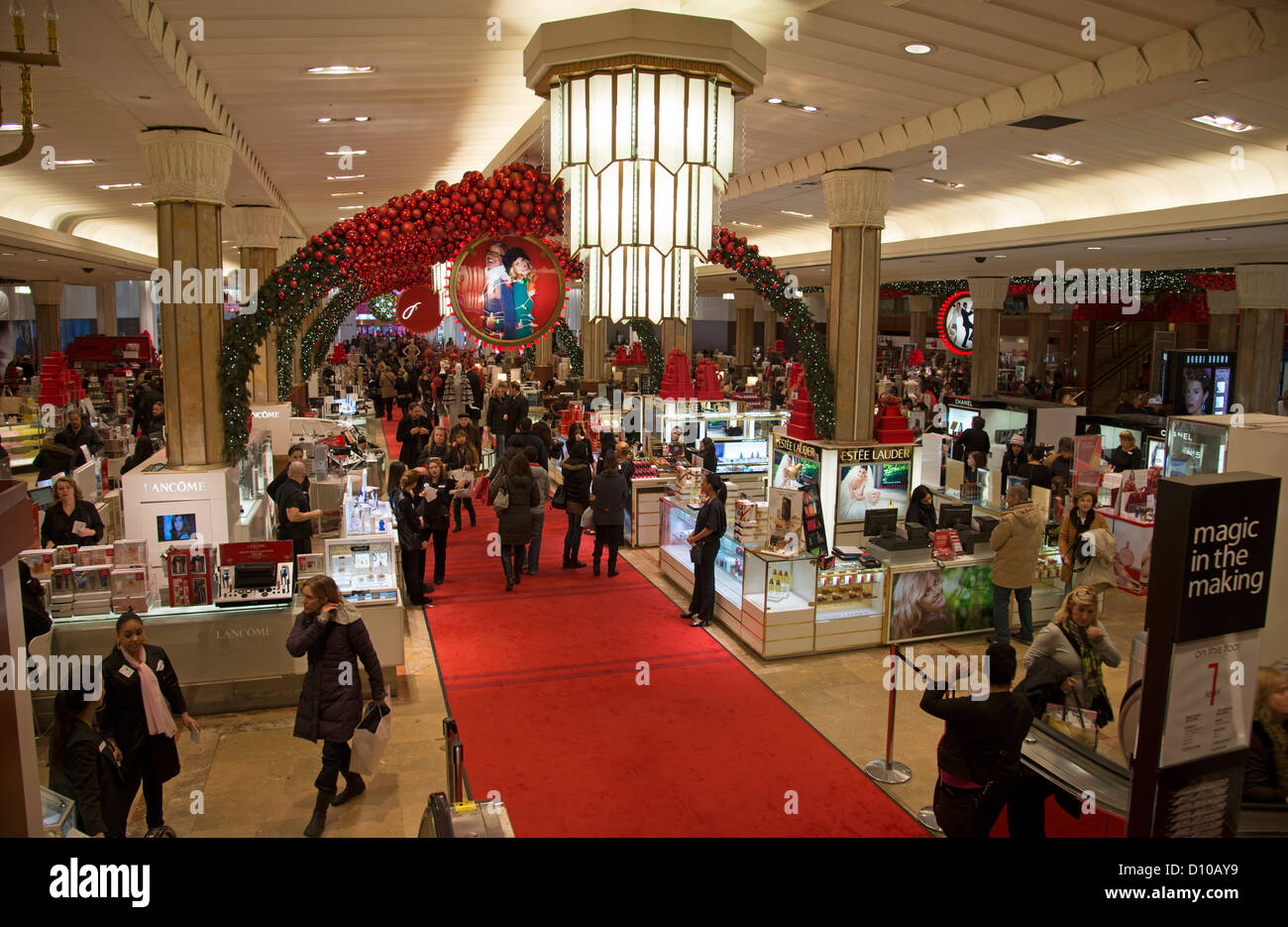 Macy's store New York USA Christmas shoppers in the perfume department Stock Photo