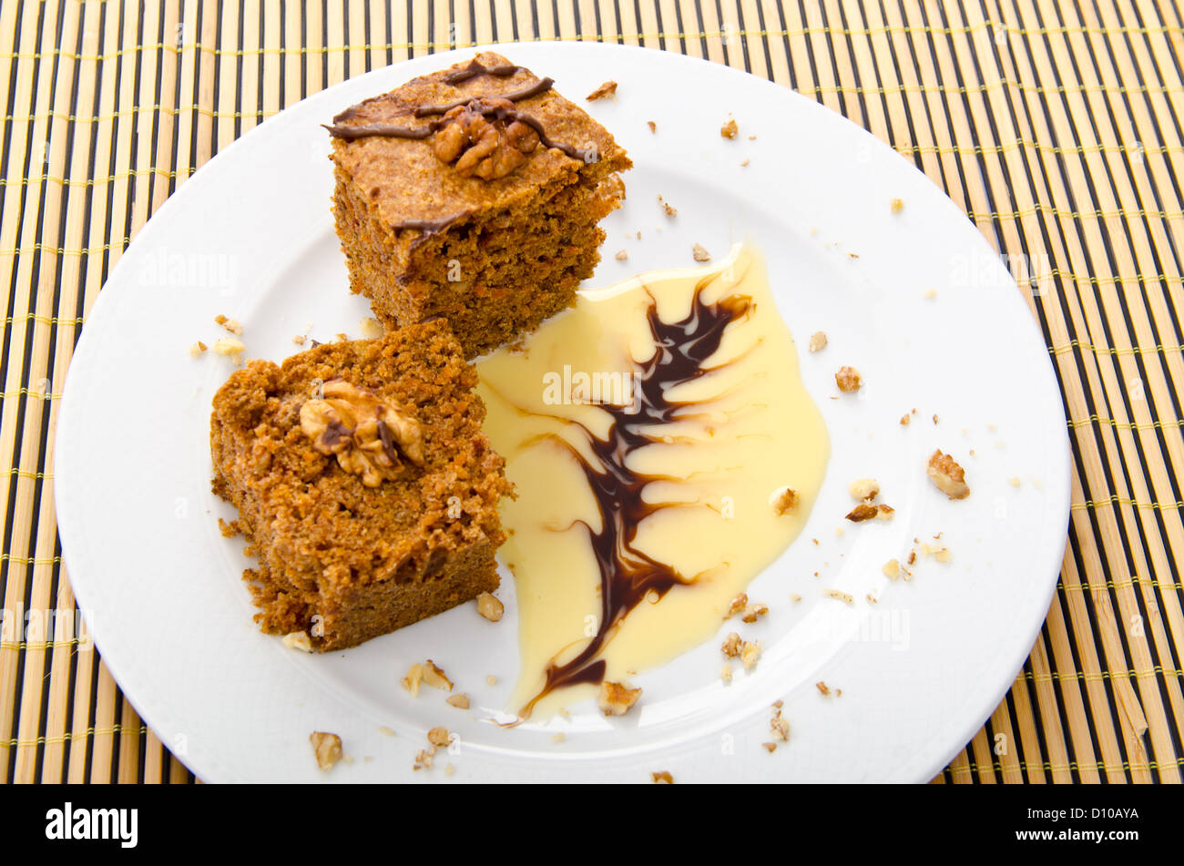 Cake with sweet sauce in plate Stock Photo Alamy