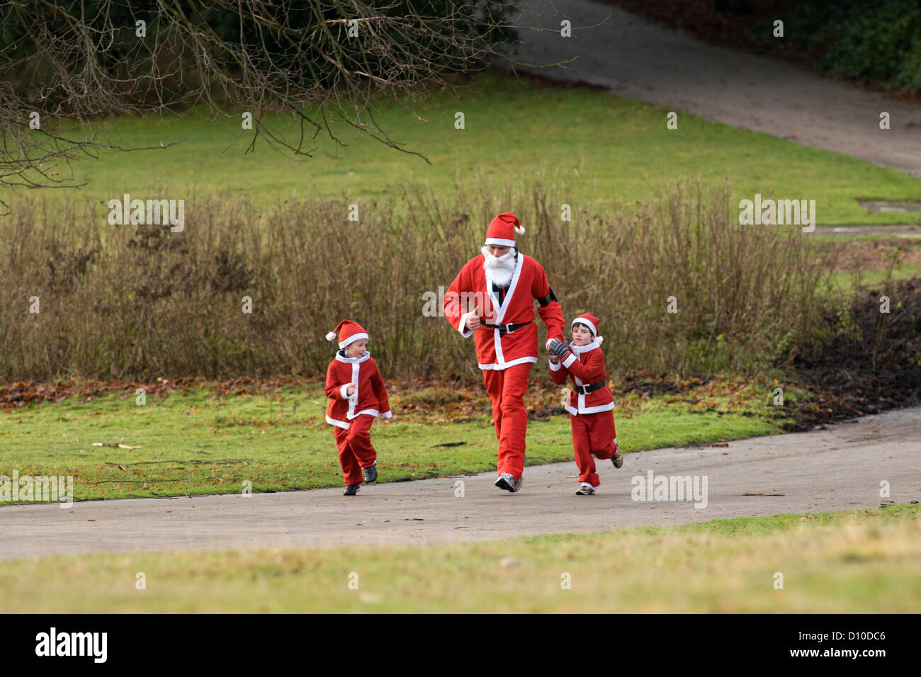 Charity Santa run to raise money for UK Diabetes which takes place in Sutton Park, Sutton Coldfield, West Midlands. Stock Photo