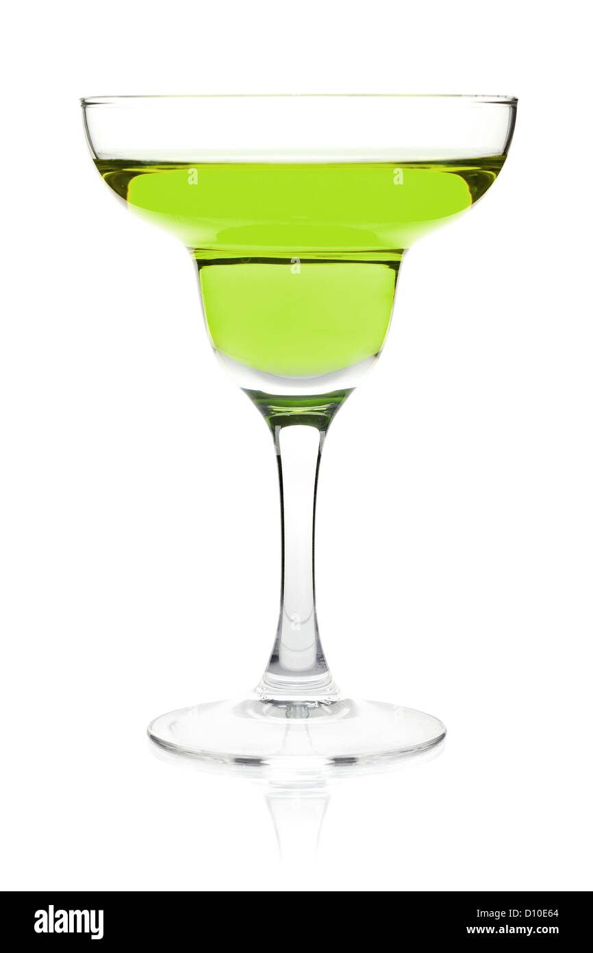 Green color drink in cocktail glass. Isolated on white background Stock