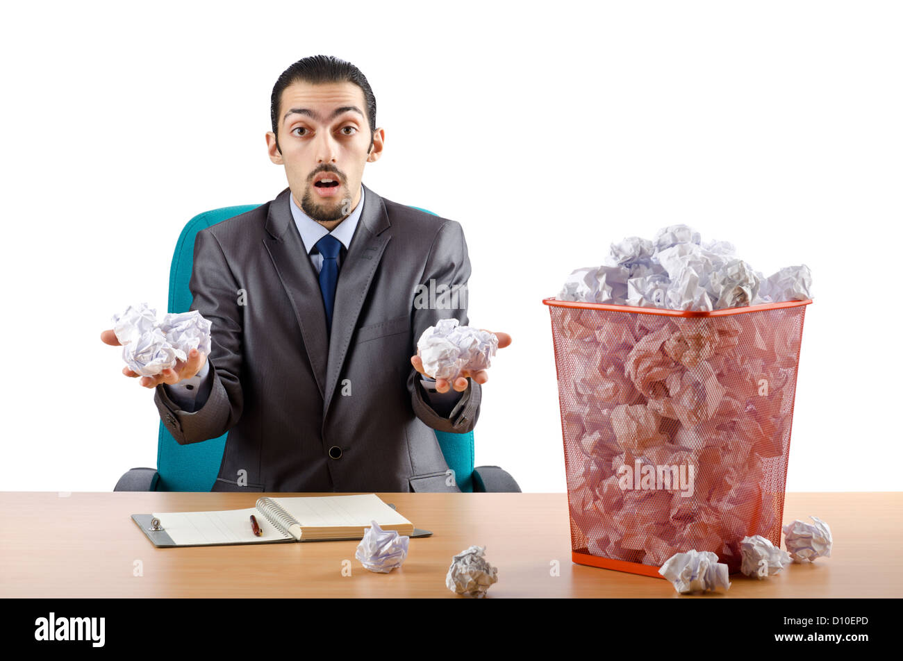 Man with lots of wasted paper Stock Photo - Alamy