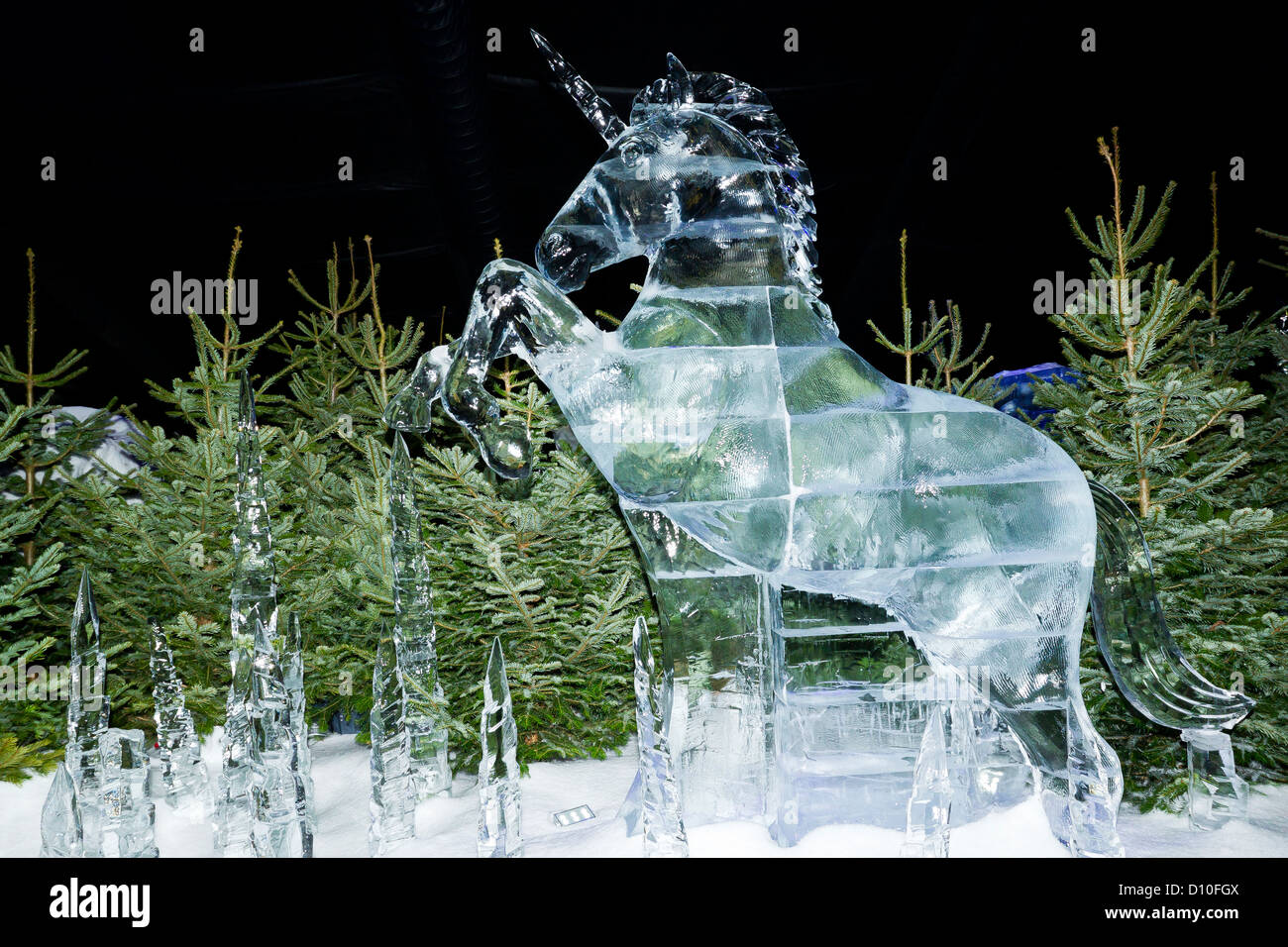 Carved Ice Sculpture Of A Unicorn In The ice Kingdom At The Winter Wonderland Hyde Park London, England, UK Stock Photo