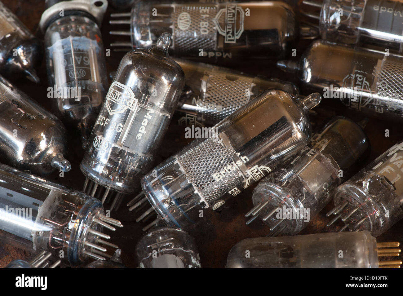 Pile of old used glass vacuum tubes used in radio and early tv crt