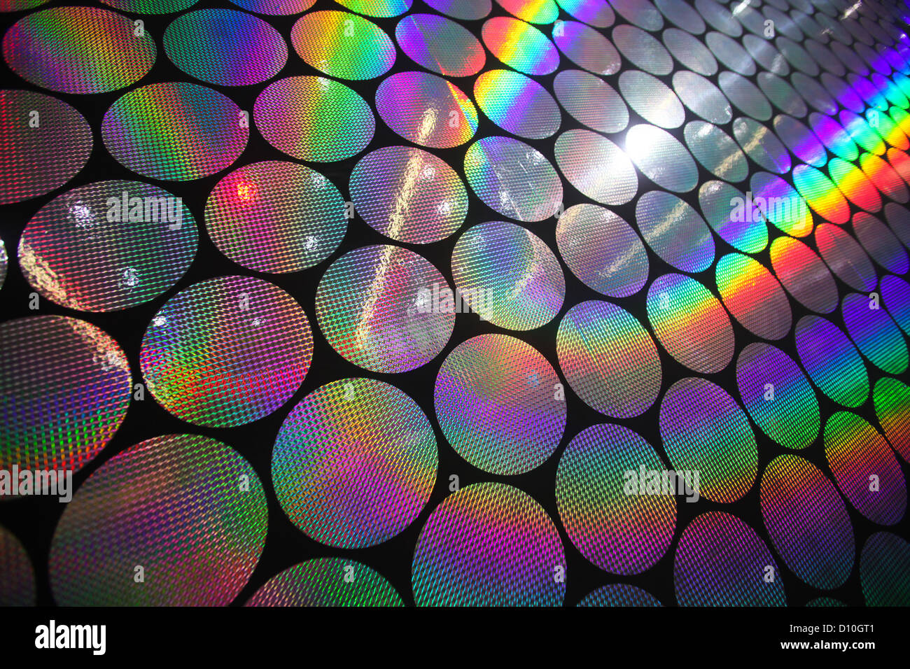 Circular holographic patterns of on background Stock Photo