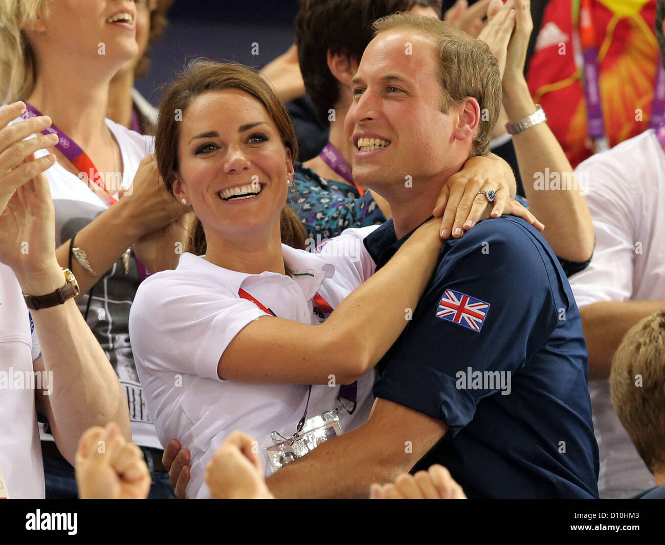 Prince William (R), Duke of Cambridge and Catherine (L), Duchess of Cambridge celebrate in the stands after Great Britain won the men's team sprint in Velodrom at the London 2012 Olympic Games, London, Great Britain, 02 August 2012. Photo: Christian Charisius dpa +++(c) dpa - Bildfunk+++ Stock Photo