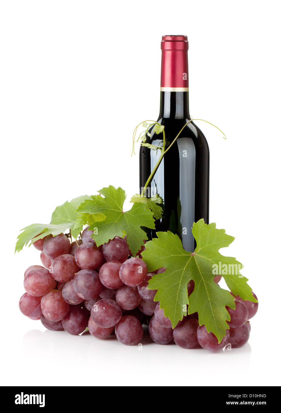 Red wine bottle and grapes. Isolated on white background Stock Photo ...