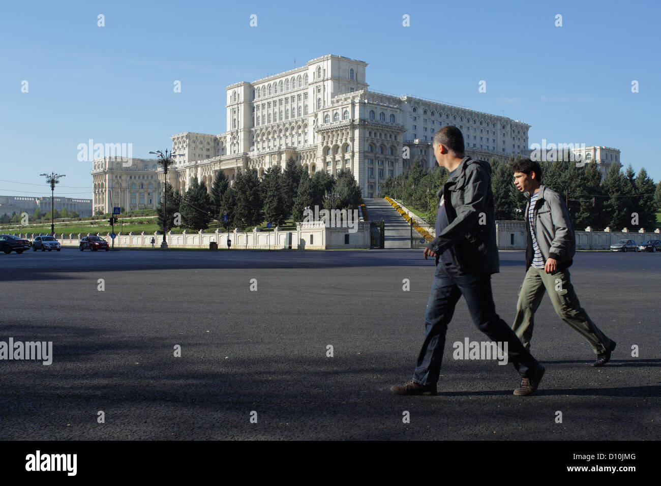 Bucharest, Romania, pedestrians cross the Piata Constitutiei, behind