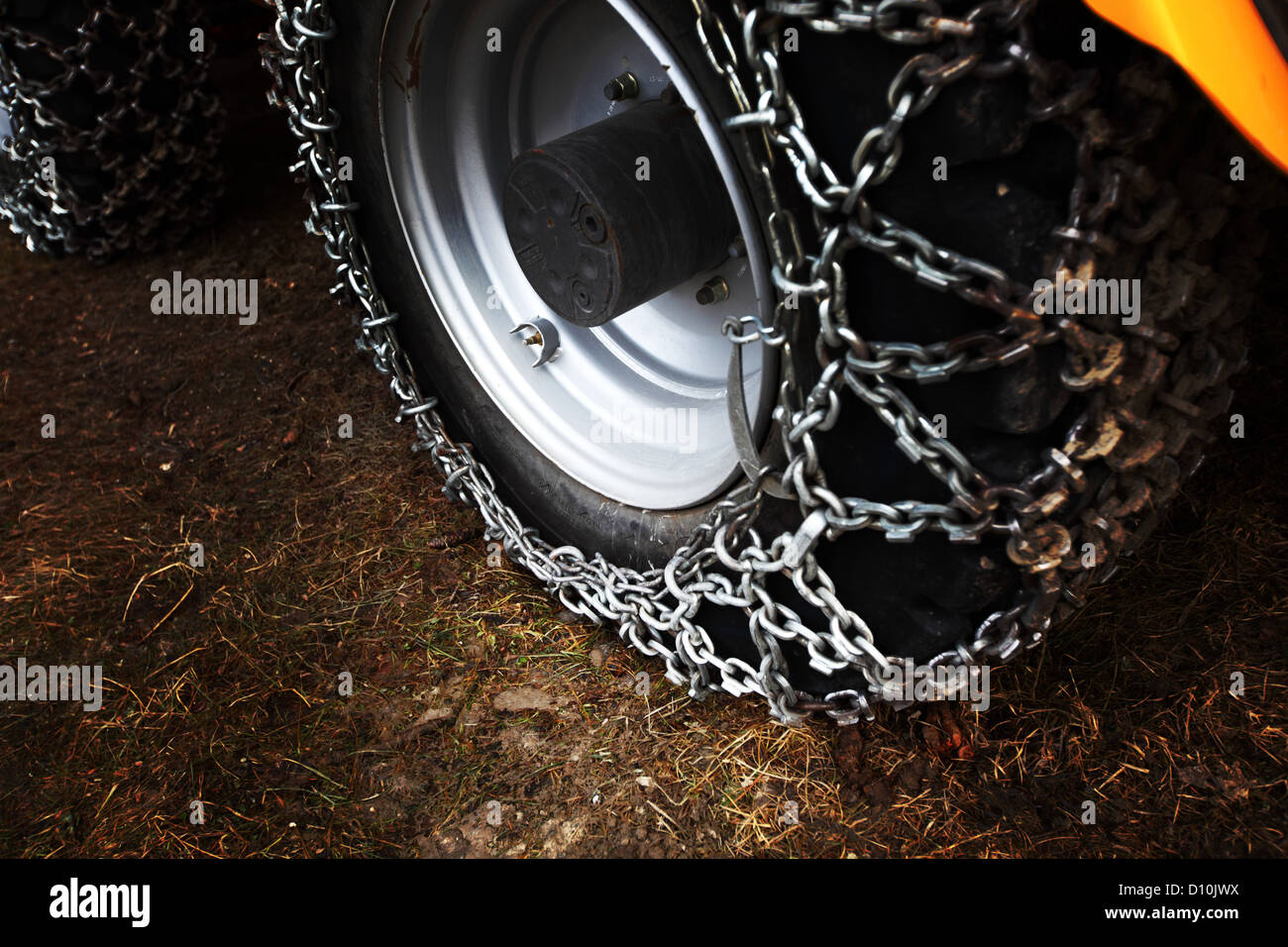 chain on the wheel of the tractor Stock Photo Alamy