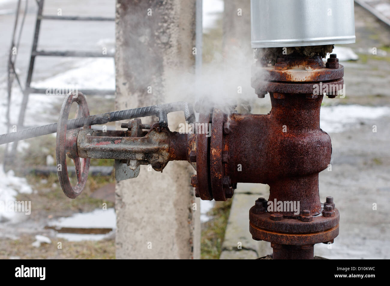 large rusty valve is broken. The steam comes out of the flange Stock