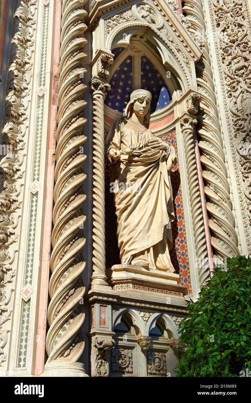 Statue of Saint Mary of the Flower on the outside of the Florence Duomo, Italy Stock Photo