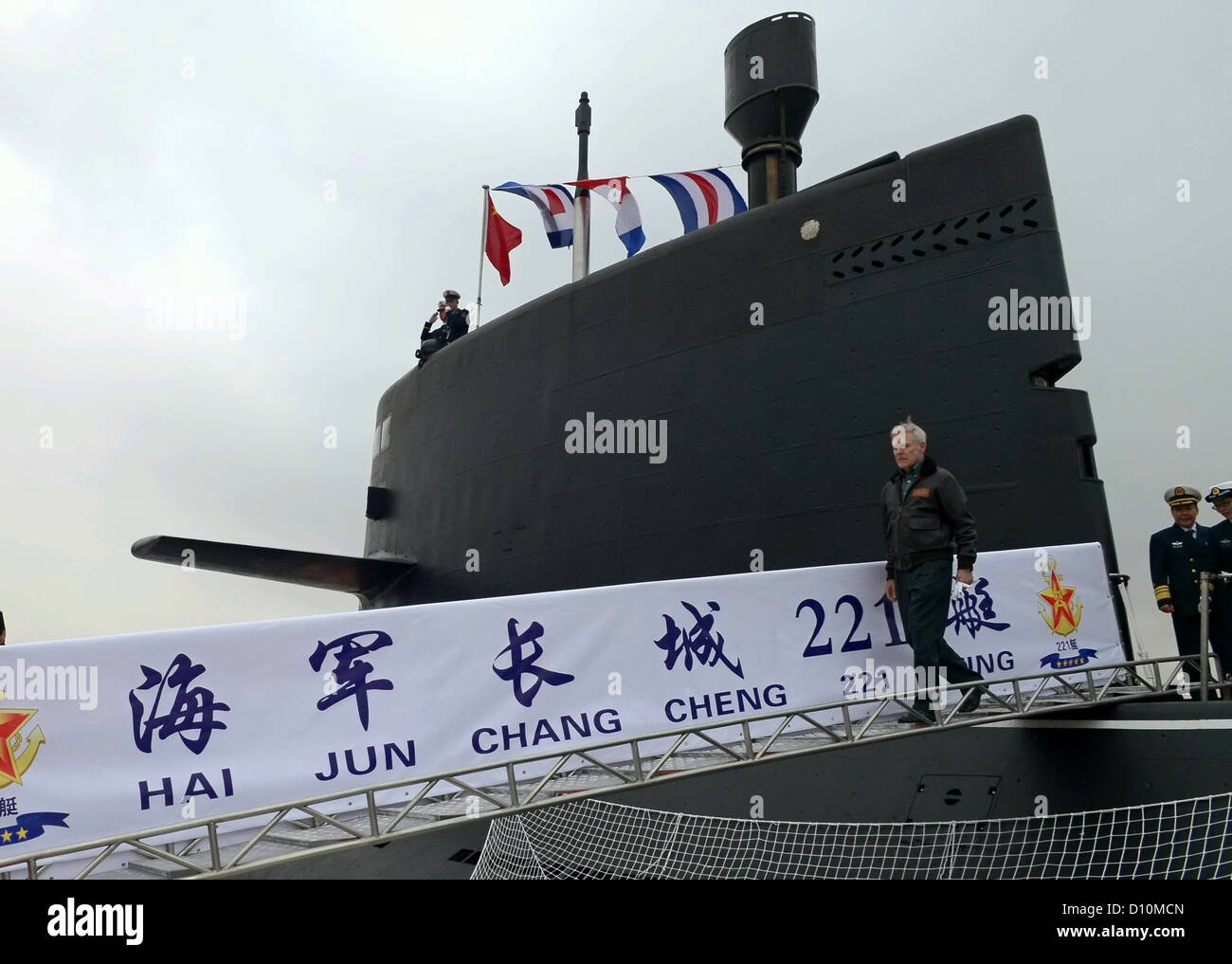 Secretary of the Navy the Honorable Ray Mabus departs the Chinese People's Liberation Army Navy Yuan-class submarine Hai Jun Chang (SSP 21). Mabus is visiting China to discuss the new U.S. defense strategy, deepening our military-to-military engagements, Stock Photo