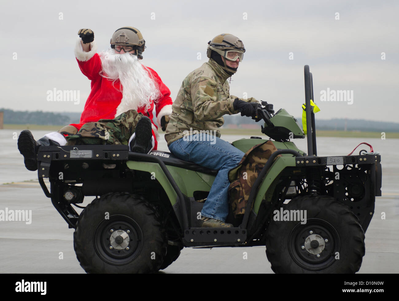 ROYAL AIR FORCE LAKENHEATH, England - Santa Claus, a North Pole native, waves to Team Lakenheath members Stock Photo