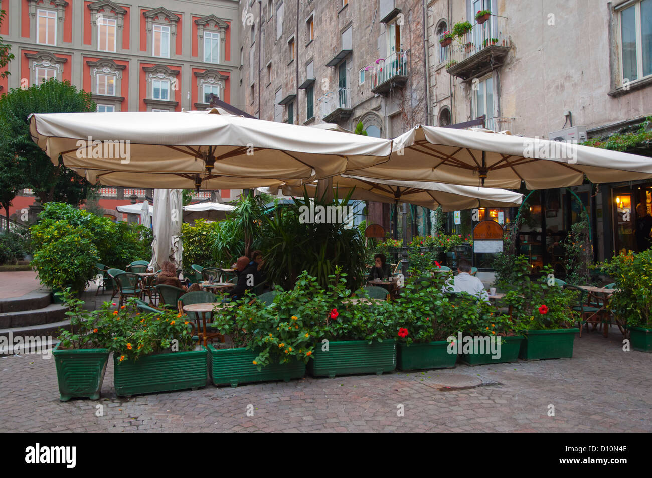 Bar cafe terrace during the day Piazza Bellini square centro storico the old town Naples city La Campania region southern Italy Stock Photo