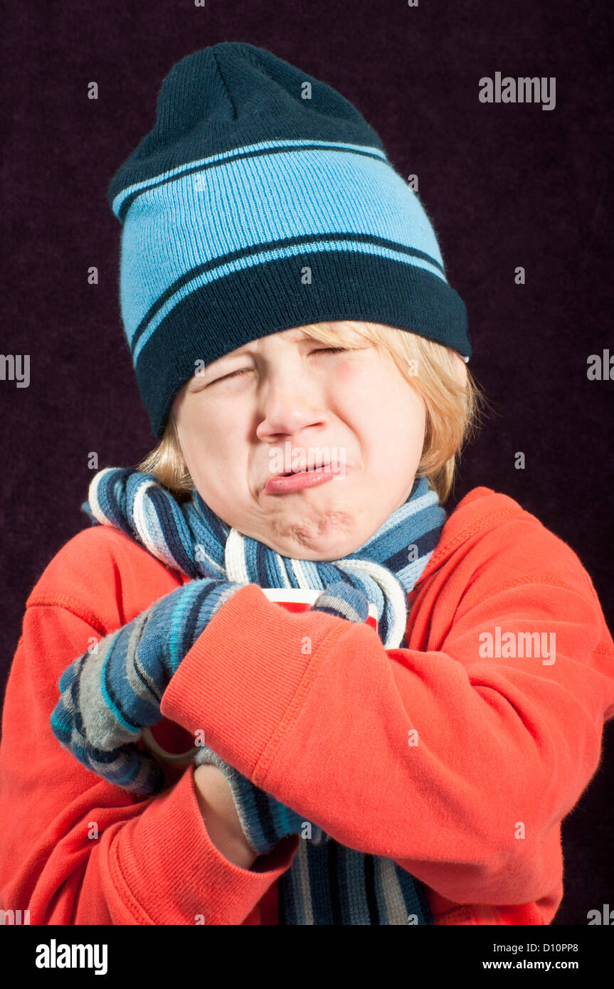 Cold boy crying Stock Photo Alamy