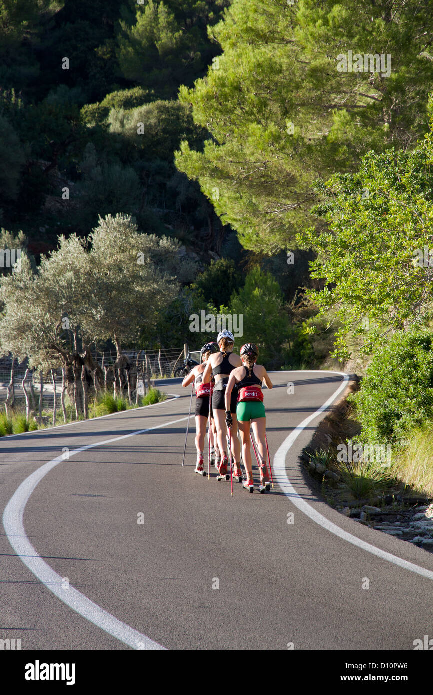 Summer cross-country Ski Training Women skiing on road sport Mallorca Balearic islands Spain europe Stock Photo