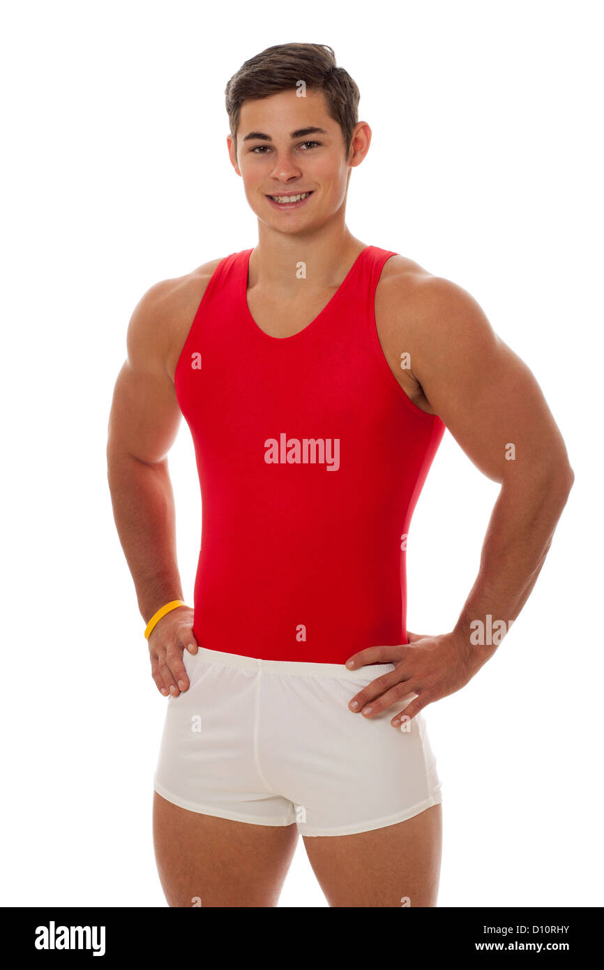 Young adult male gymnast. Studio shot over white. Stock Photo