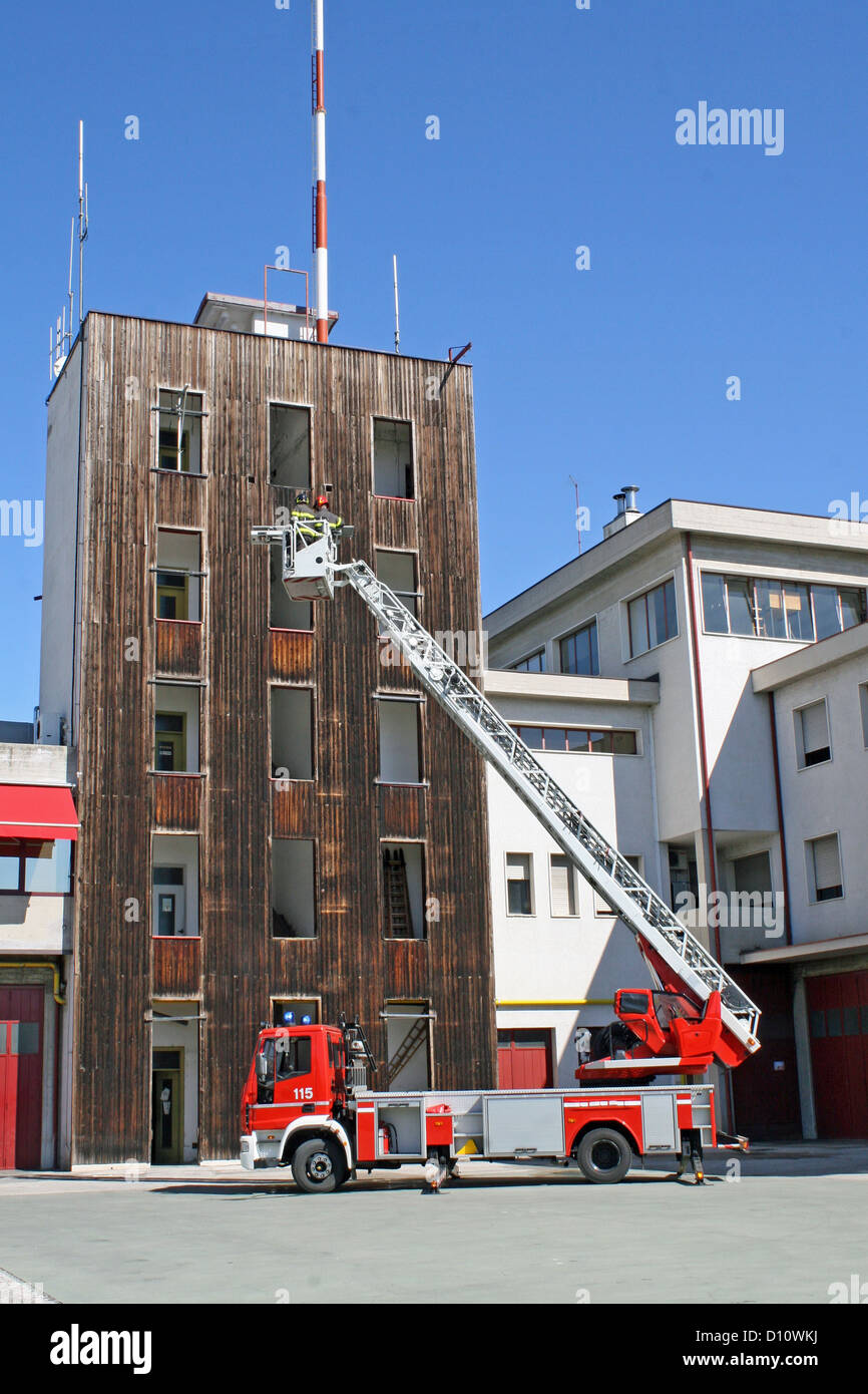 Italian fire trucks ladder truck during a rescue mission Stock Photo