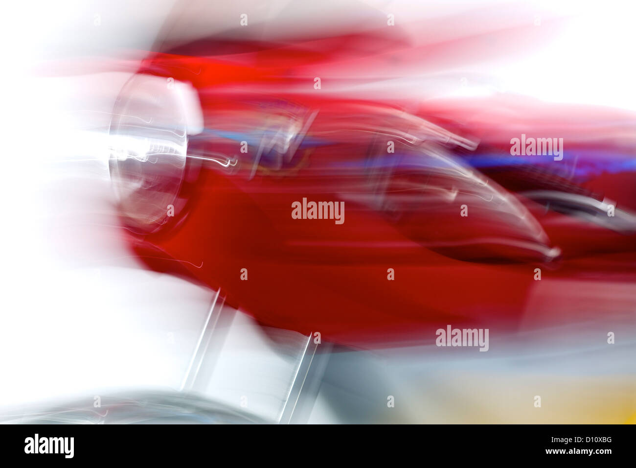 Blurred motion of red motor bike Stock Photo