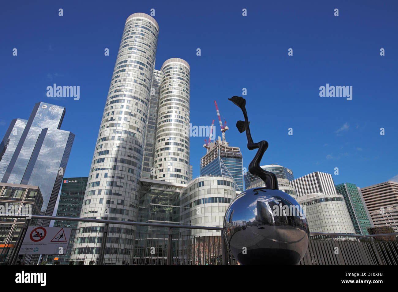 Tower Coeur Défense and headquarters of Total and the sculpture of Lim Dong-Lak in La Défense in Paris (Puteaux) Stock Photo