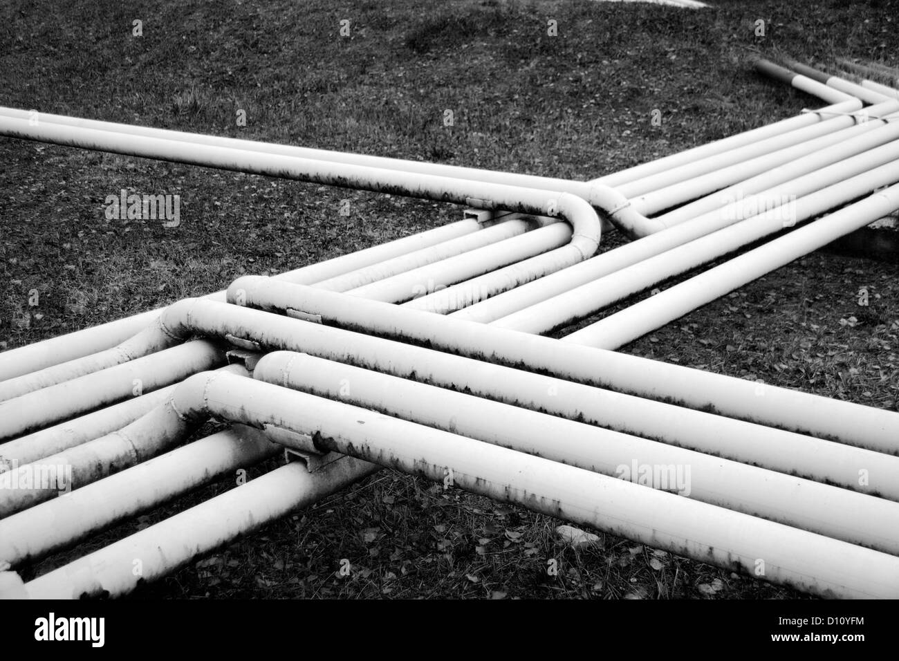 Fuel (oil) pipes in territory of a petrofactory Stock Photo