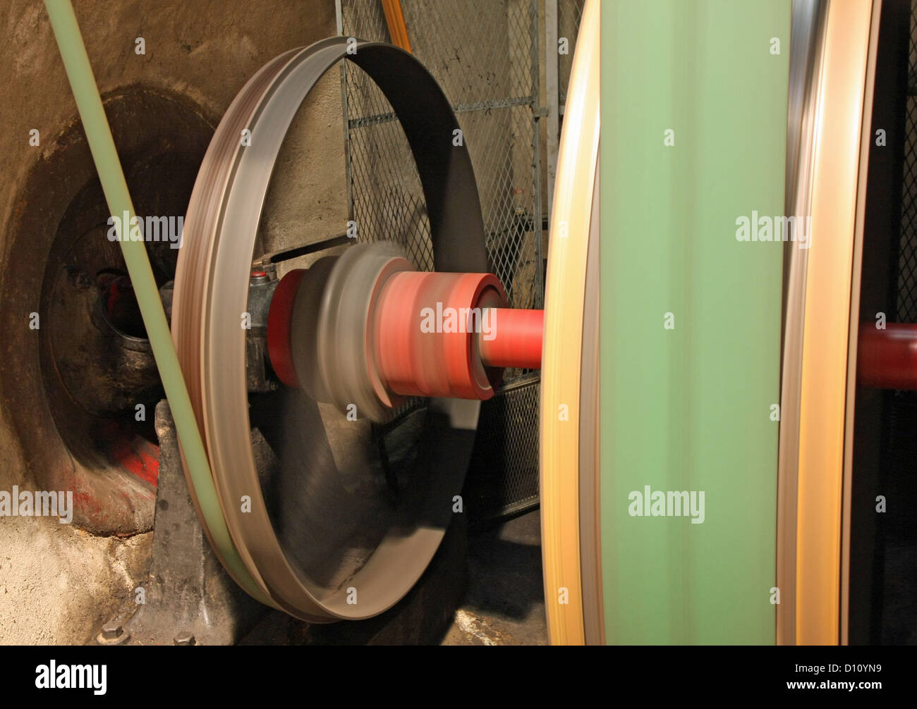 straps and wheels that are spinning at high speed to generate