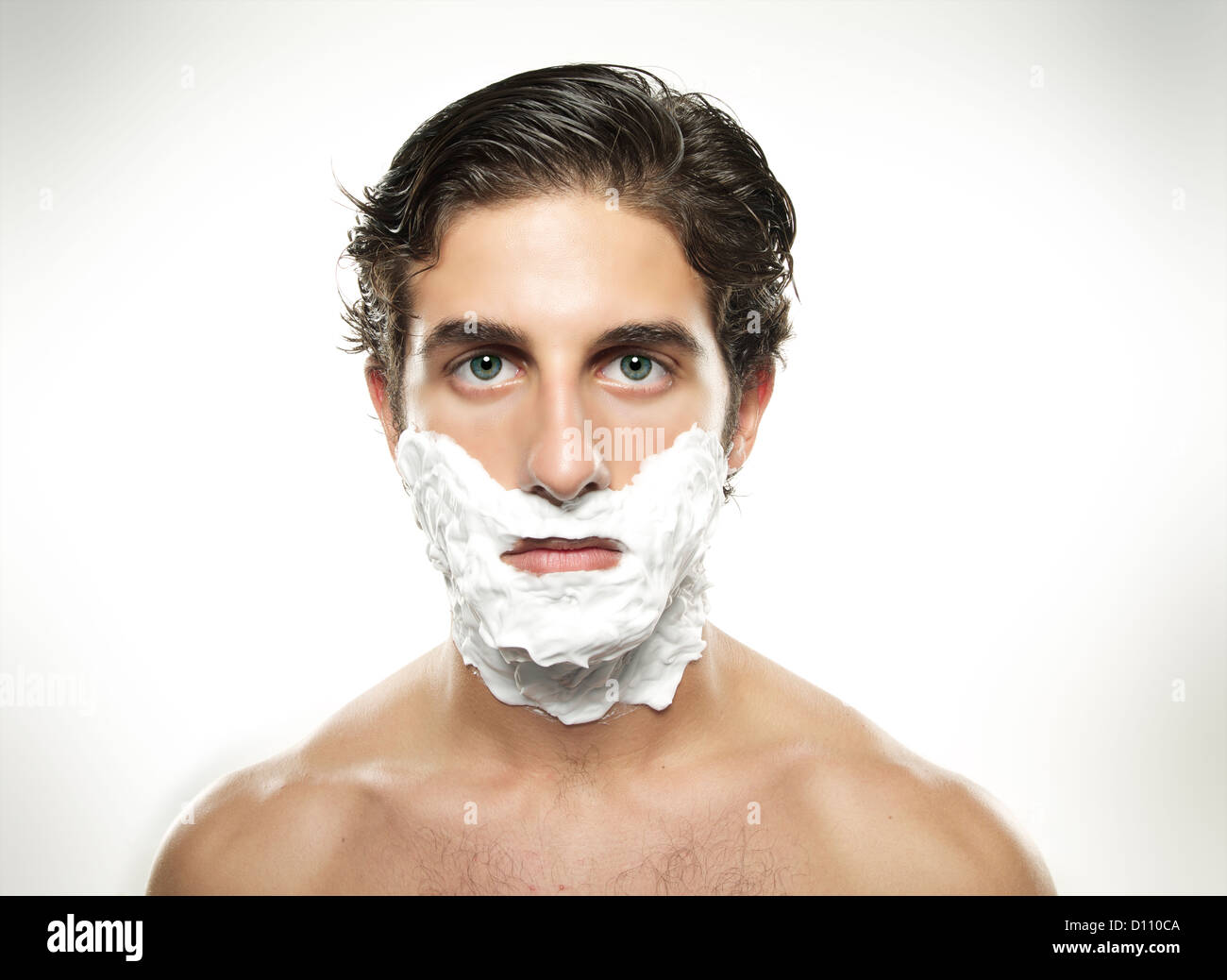 Young man with shaving cream on his face Stock Photo Alamy