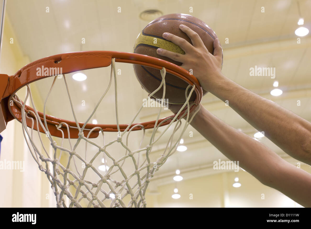 scoring basket in basketball court Stock Photo Alamy