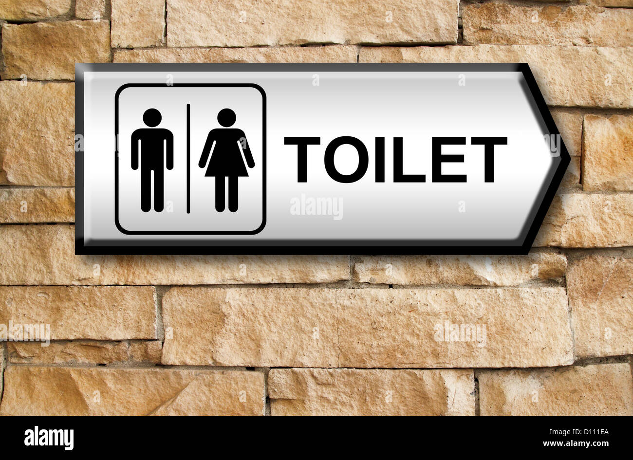 toilet sign on brick wall background Stock Photo - Alamy