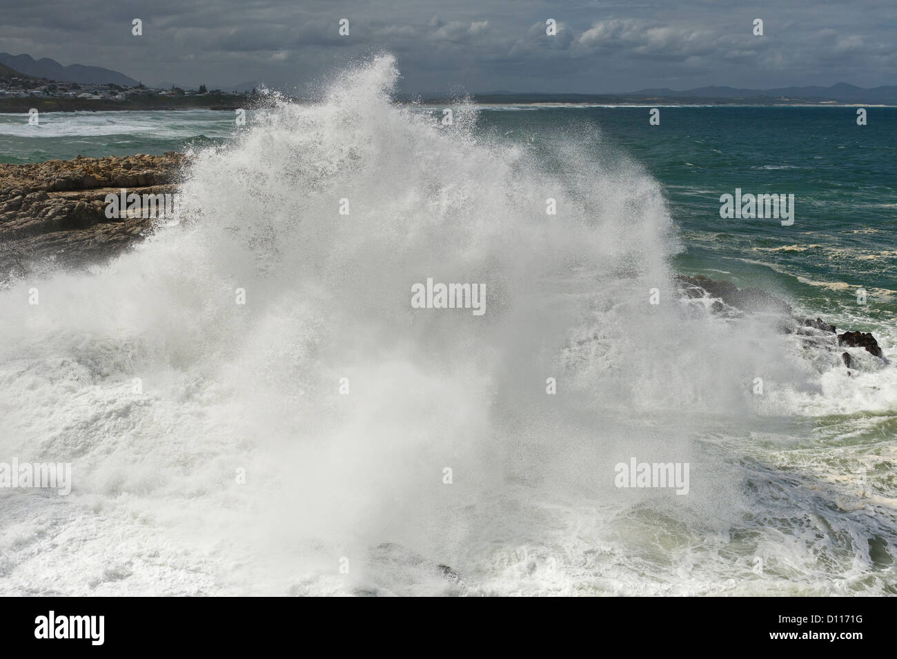 Wave crushing on rocks, Hermanus, South Africa Stock Photo