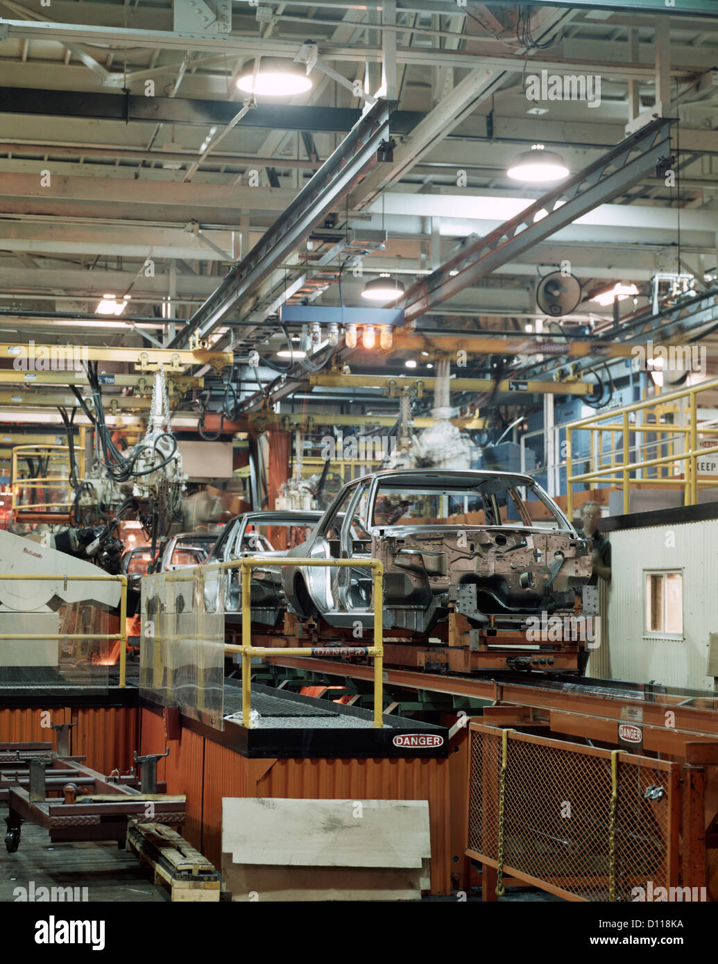 1970s AUTOMOBILE FACTORY CHRYSLER CAR ON ASSEMBLY LINE Stock Photo
