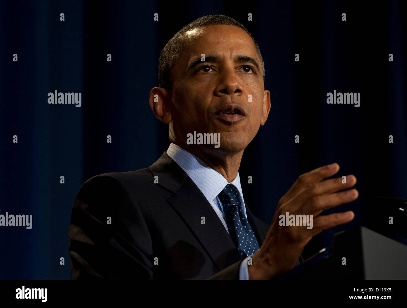 US President Barack Obama thanks Senators Nunn and Lugar for their work to help de-nucularize countries after the fall of the Soviet Union at the National Defense University December 3, 2012 in Washington DC. The Senators were awarded the Defense Civilian Service Award, the highest award the Department of Defense can give a civilian. Stock Photo