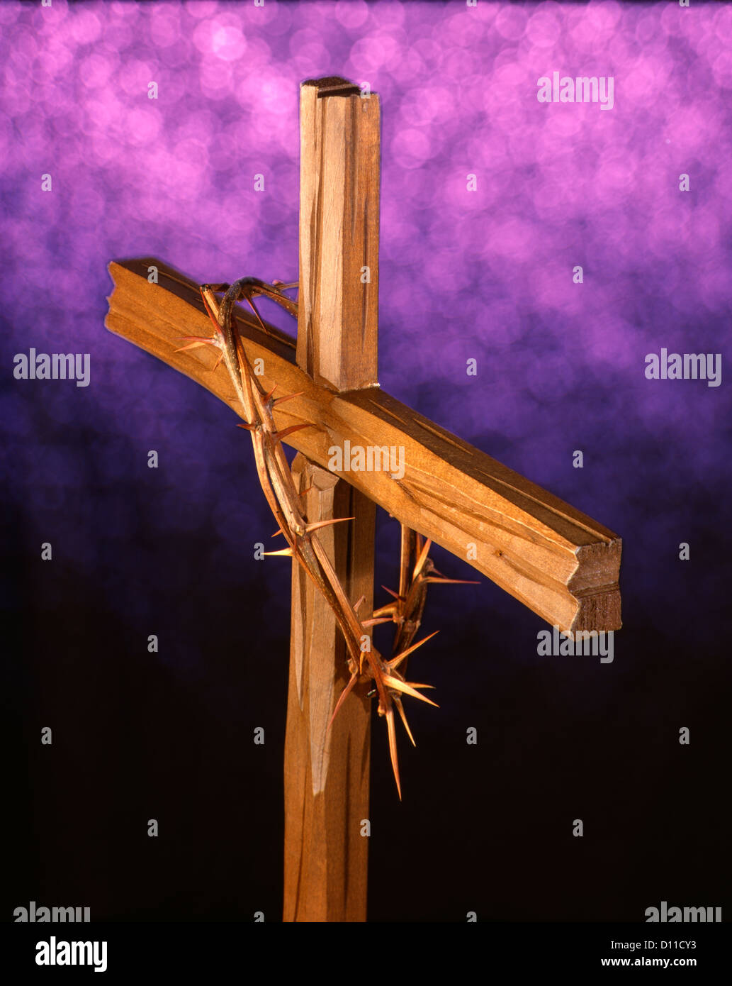 WOODEN CROSS AND CROWN OF THORNS Stock Photo