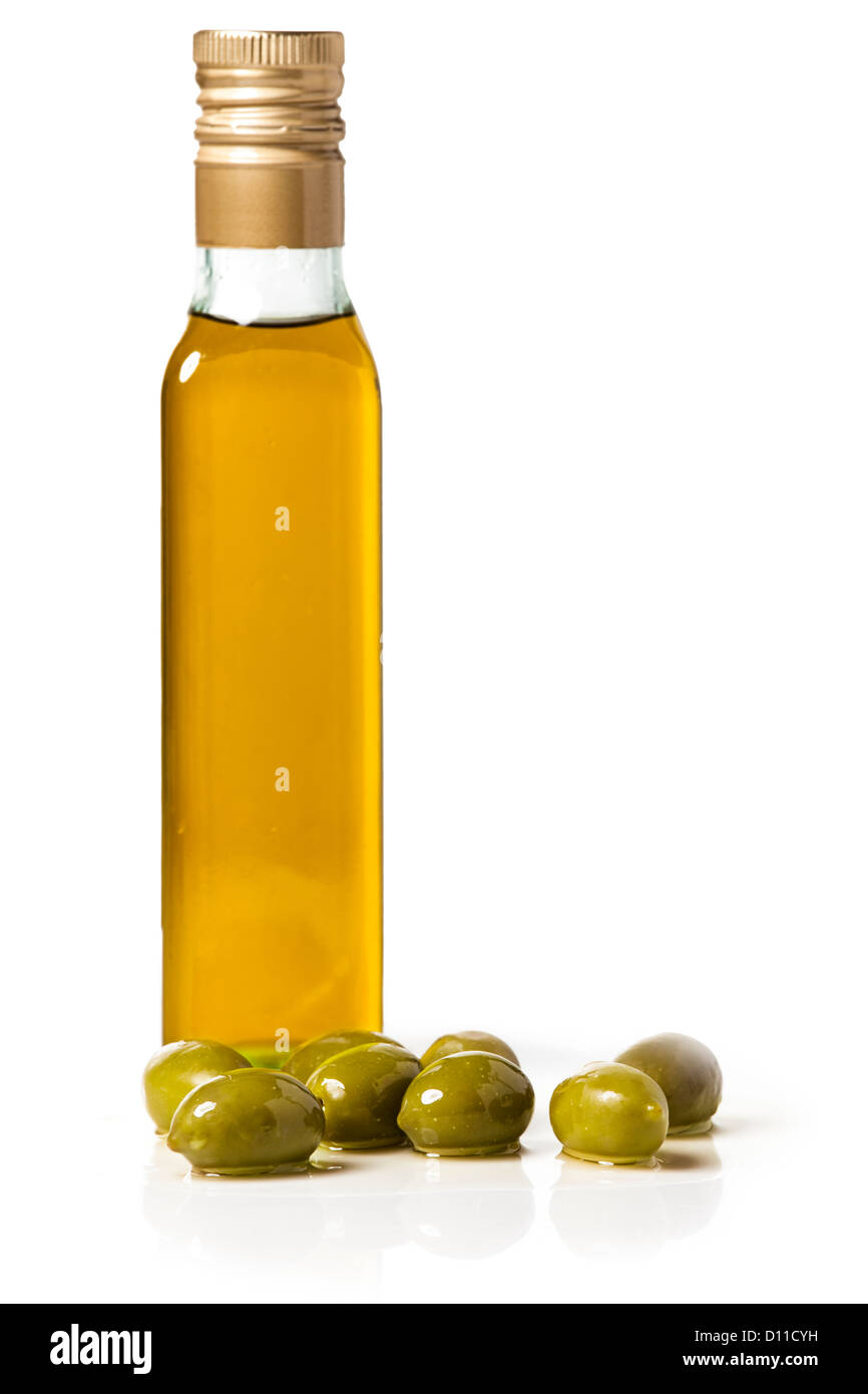Bottle of olive oil with olives, on white background Stock Photo Alamy