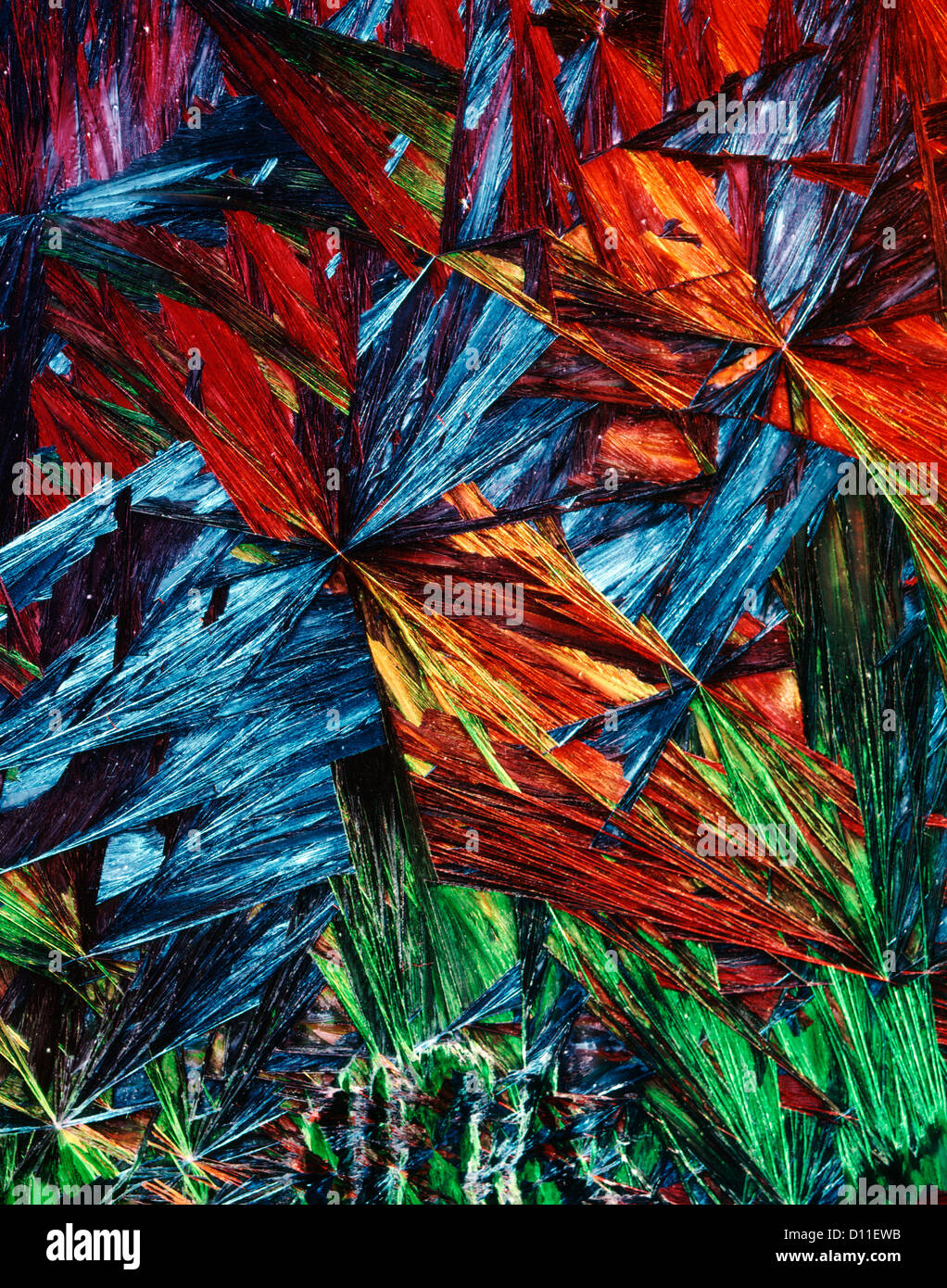 ABSTRACT ORANGE BLUE GREEN PATTERN OF CRYSTALS ICE PSYCHEDELIC WEIRD Stock Photo